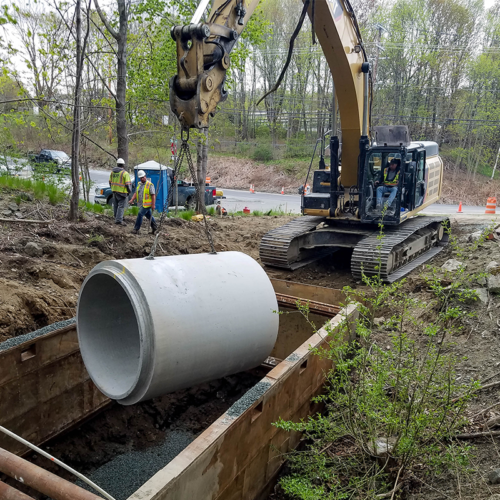 Our Crew Installing Drainage Cement Pipe At Bar Harbor Route 3