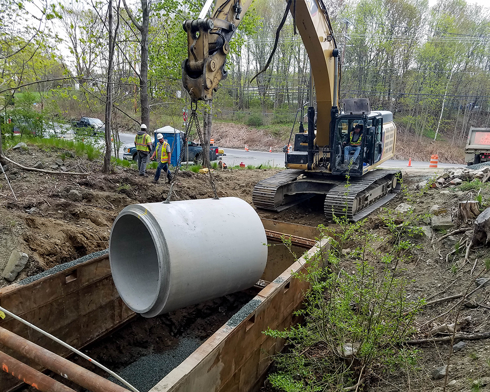 Our Crew Installing Drainage Cement Pipe At Bar Harbor Route 3