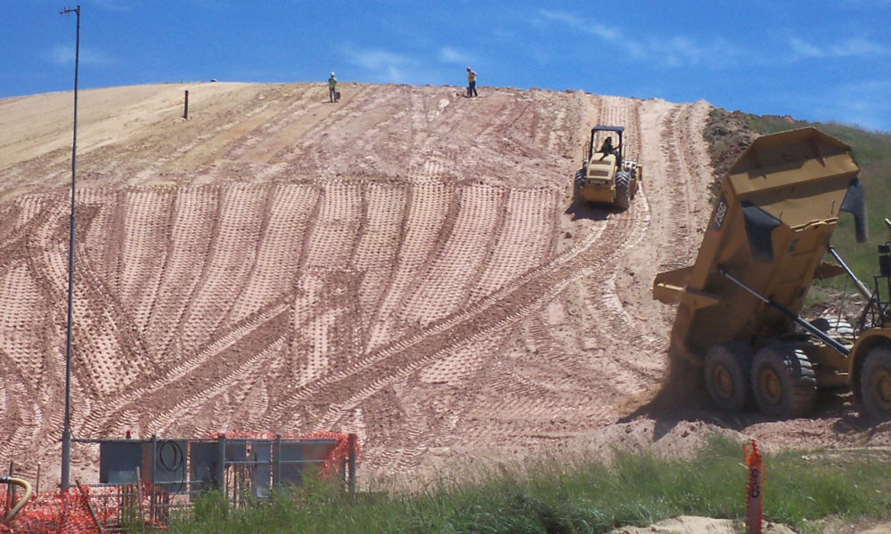 Our Crew Working On Landfill Project Site View