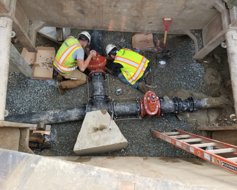 Sargent's Crew Working Together On Replacing Water Main At Union & 14 Street Water