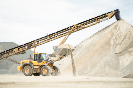 Excavator On Lifting Asphalt Aggregates